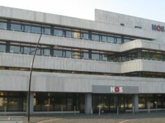 Vier mensen aangehouden voor bekladding NOS-gebouw NOS